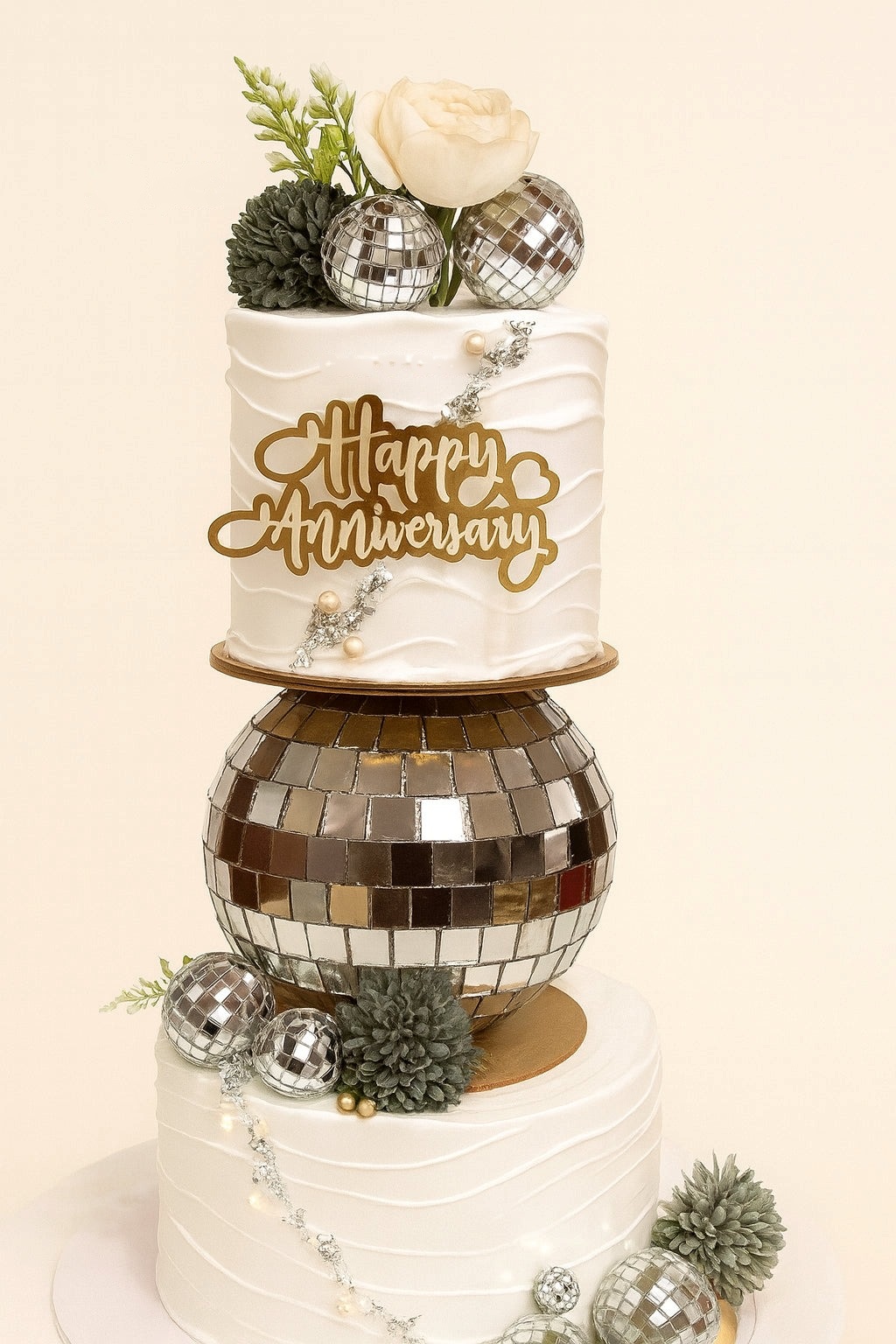 Elegant White Anniversary Revolving Cake